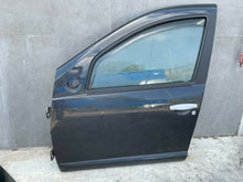 Load image into Gallery viewer, PORTA PORTIERA SPORTELLO ANTERIORE SINISTRA SX DACIA SANDERO B90 2008 2012 SPEDIZIONE GRATUITA
